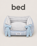 Blue tweed pet bed with plush striped interior and blue plaid bow accents