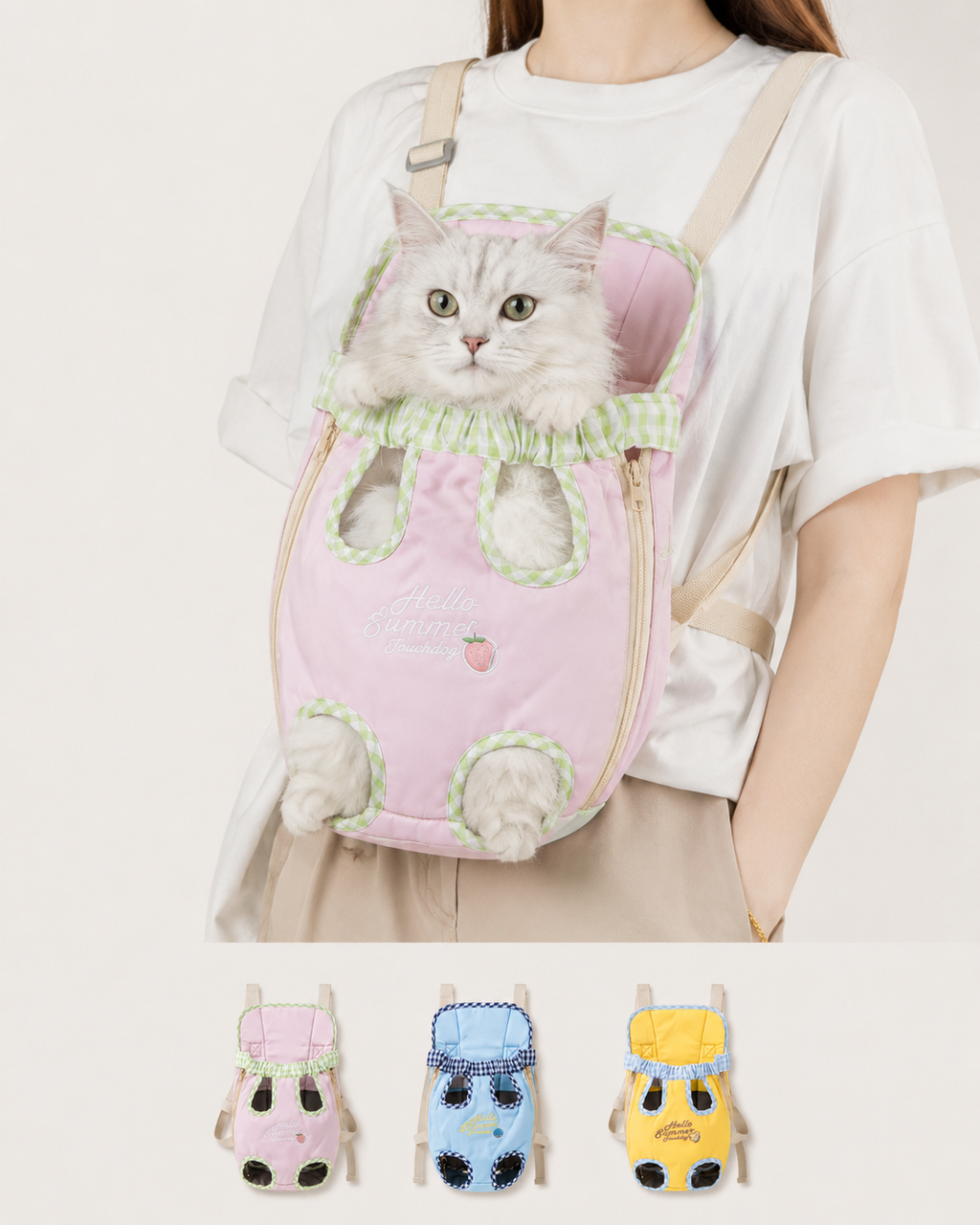 Cat being carried in pink gingham pet carrier backpack