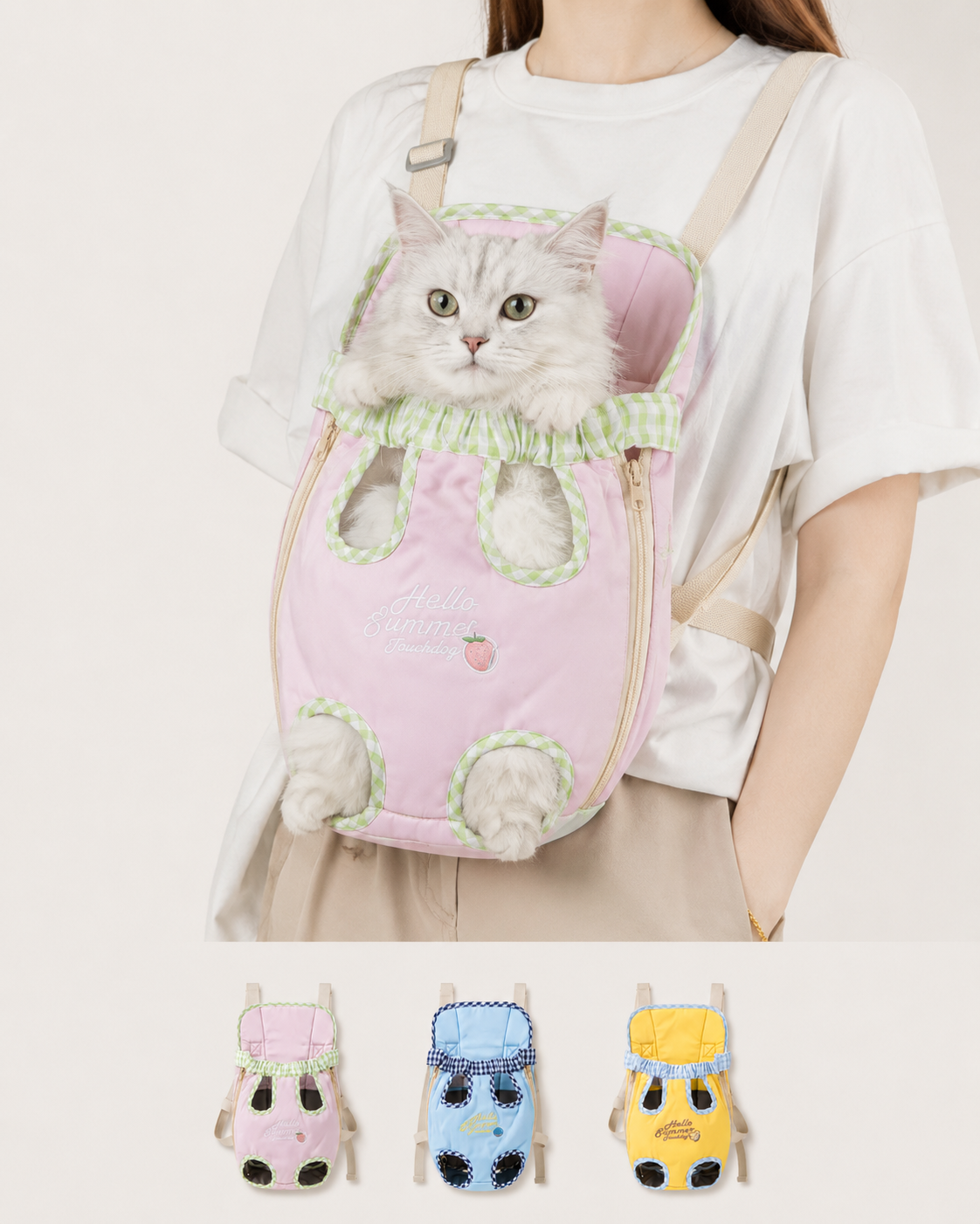 Cat being carried in pink gingham pet carrier backpack