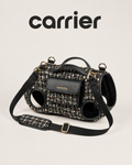 Black tweed pet carrier bag with four leg openings, front pocket and gold-tone hardware